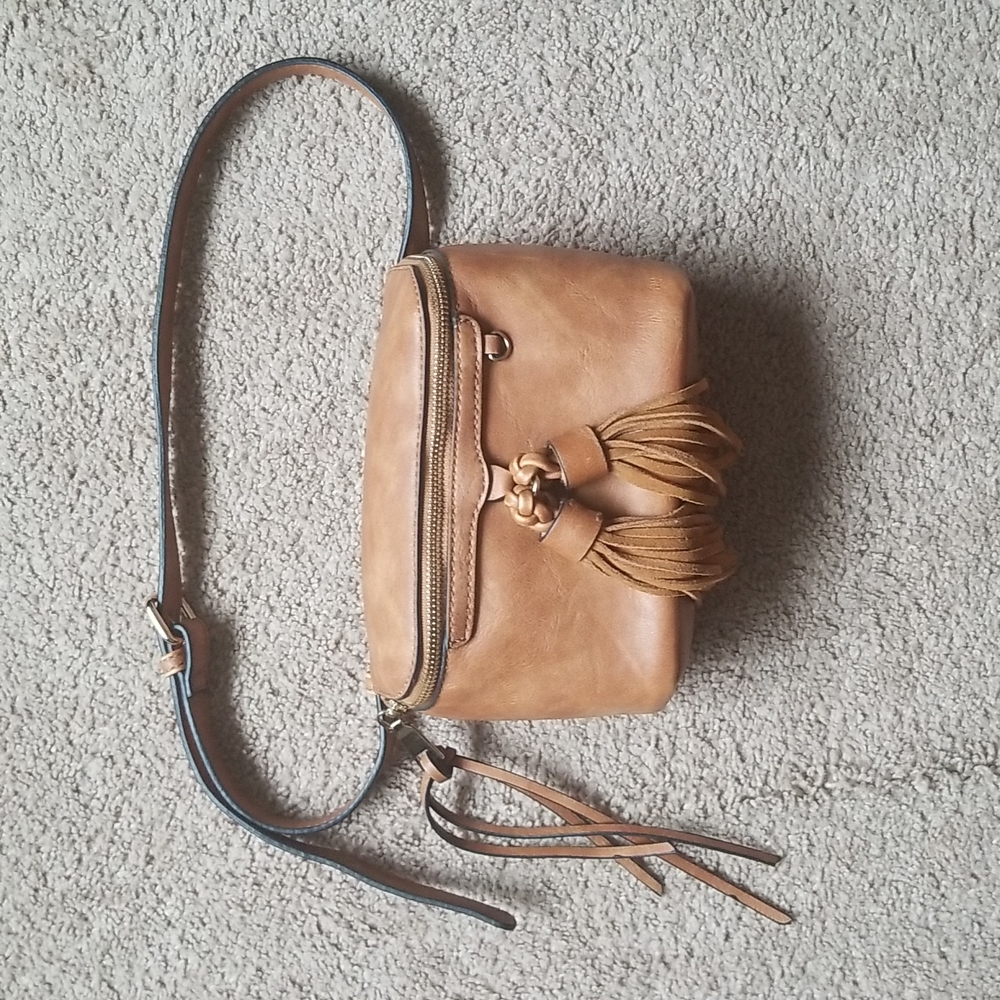Moda Luxe cognac adjustable waist bag with tassles